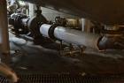 Used Approximate 5200 gallon Stainless Steel Mixing Tank. 12C. Includes centrifugal pump.