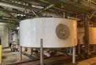 Used Approximate 5200 gallon Stainless Steel Mixing Tank, V-4541. With Centrifugal pump, 60/50 HZ, 1745-1450 RPM, 230/460V. Griswold S/N 0030022629. Tom 2014. Model S-AA-11062.