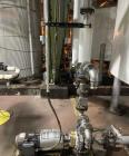 Used Approximate 5200 gallon Stainless Steel Mixing Tank, V-4541. With Centrifugal pump, 60/50 HZ, 1745-1450 RPM, 230/460V. Griswold S/N 0030022629. Tom 2014. Model S-AA-11062.