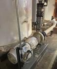 Used Approx. 7,900 Gallon Stainless Steel Mixing Tank with Griswold Pump – V-4313