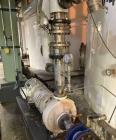 Used Approx. 7,900 Gallon Stainless Steel Mixing Tank with Griswold Pump – V-4313