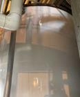 Used Approx. 7,900 Gallon Stainless Steel Mixing Tank with Pump Package – V-4319