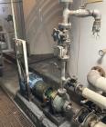 Used Approx. 7,900 Gallon Stainless Steel Mixing Tank with Pump Package – V-4319