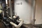 Used Approx. 7,900 Gallon Stainless Steel Mixing Tank with Pump Package – V-4319
