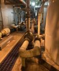 Used Approx. 7,900 Gallon Stainless Steel Mixing Tank with 25 HP Centrifugal Pump – V-4303
