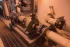Used Approx. 7,900 Gallon Stainless Steel Mixing Tank with 25 HP Centrifugal Pump – V-4303