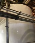 Used Approximate 7900 gallon Stainless Steel Mixing Tank, V-4206. With a Worthington pump model D1012. 316 SS. S/N Y715556. 7.5 HP, 3 PH, 50/60 HZ, 208-230V.