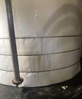 Used Approximate 7900 gallon Stainless Steel Mixing Tank, V-4206. With a Worthington pump model D1012. 316 SS. S/N Y715556. 7.5 HP, 3 PH, 50/60 HZ, 208-230V.
