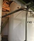 Used Approximate 7900 gallon Stainless Steel Mixing Tank, V-4320. Pump P-4320: Industrial Electric Motor. 60 hz, 230/460 V.