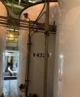 Used Approximate 7900 gallon Stainless Steel Mixing Tank, V-4320. Pump P-4320: Industrial Electric Motor. 60 hz, 230/460 V.