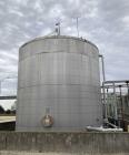 Used Approximate 80,000 gallon 316L Stainless Steel Storage Tank, T-1018. Dished top with misc. top inlets. Flat self supporting bottom. 20