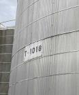 Used Approximate 80,000 gallon 316L Stainless Steel Storage Tank, T-1018. Dished top with misc. top inlets. Flat self supporting bottom. 20