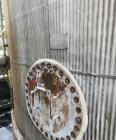 Used Approximate 80,000 gallon 316L Stainless Steel Storage Tank, T-1019. Dished top with misc. top inlets. Flat self supporting bottom. 20