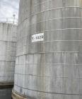 Used Approximate 80,000 gallon 316L Stainless Steel Storage Tank, T-1020. Dished top with misc. top inlets. Flat self supporting bottom. 20