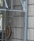Used Approximate 80,000 gallon 316L Stainless Steel Storage Tank, T-1021. Dished top with misc. top inlets. Flat self supporting bottom. 20