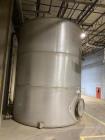 Wolfe Mechanical approximately 12,600 gallon 304L stainless steel vertical tank.