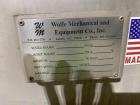 Wolfe Mechanical approximately 12,600 gallon 304L stainless steel vertical tank.