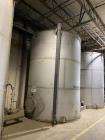 Wolfe Mechanical approximately 10,000 gallon 304L stainless steel vertical tank.