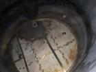 Wolfe Mechanical approximately 12,600 gallon 304L stainless steel vertical tank.