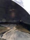 Wolfe Mechanical approximately 12,600 gallon 304L stainless steel vertical tank.
