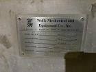 Wolfe Mechanical approximately 12,600 gallon 304L stainless steel vertical tank.