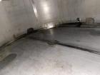 Wolfe Mechanical approximately 12,600 gallon 304L stainless steel vertical tank.