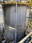 Used Vertical Stainless Steel Tank, Approx. 6,000 gallon capacity.