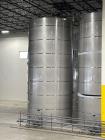 Used 2022 Single wall 35,000 Gallon stainless steel vertical silo, 14ft Diameter X 30ft High, front manways, (TK 112), with top-mounted agitator