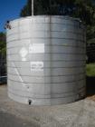 Used 11,000 gallon stainless steel storage tank, approximately 12'6