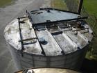 Used 11,000 gallon stainless steel storage tank, approximately 12'6
