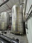 Used Approximate 10,000 Gallon Stainless Steel Tank. Approximate 120
