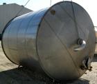 USED: Tank, 10,000 gallon, 304 stainless steel, vertical. Approximate 11' diameter x 14' straight side. Coned top, sloped bottom. Openings: top 18