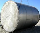 USED: Tank, 10,000 gallon, 304 stainless steel, vertical. Approximate 11' diameter x 14' straight side. Coned top, sloped bottom. Openings: top 18