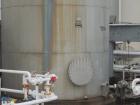 USED: Tank, 15,000 gallon, stainless steel. Approximate 10'6