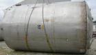 USED: Tank, 11,700 gallon, 304 stainless steel, vertical. Approximately 132