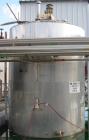 USED: Approximate 6000 gallon stainless steel mix tank. Approximate 9' diameter x 140