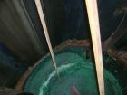 USED: Approximate 6000 gallon stainless steel mix tank. Approximate 9' diameter x 140