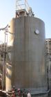 USED: Approximate 15,000 gallon stainless steel mix tank. Approximate 11'6