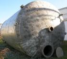 USED: Approximate 14,000 gallon stainless steel storage tank. Vertical, dished heads, 5' skirt bottom. 11'6