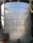 USED: Approximate 6,000 gallon stainless steel storage tank. Flat top and bottom. 10' diameter x 10' straight side. 3