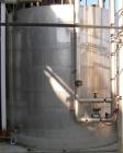 USED: Approximate 6,000 gallon stainless steel storage tank. Flat top and bottom. 10' diameter x 10' straight side. 3
