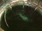 USED: Approximate 6,000 gallon stainless steel storage tank. Flat top and bottom. 10' diameter x 10' straight side. 3