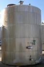 USED: Tank, 7,000 gallon, stainless steel, insulated, vertical. 10' diameter x 12' straight side. Dish top, flat bottom. Top openings: manway with cover, misc top openings. Shaft and impeller driven ...