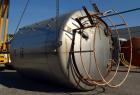 Used APV Crepaco Tank, Approximately 11,000 gallons, 304 Stainless Steel, Vertical. Approximate 138” diameter x 164” straight side, dished top, coned bottom. Approximate 60” wide section of bottom si...