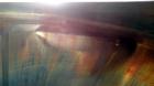 Used APV Crepaco Tank, Approximately 11,000 gallons, 304 Stainless Steel, Vertical. Approximate 138” diameter x 164” straight side, dished top, coned bottom. Approximate 60” wide section of bottom si...