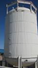 Used Stainless Steel Tank, 10,000 gallon capacity, 316 stainless steel construction. Vertical pressure storage, rated for 100 psi @ 300 deg F, vertical orientation, measures approximately 10 1/2' dia...