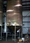 Used Apache Tank, 6500 Gallon, 316 Stainless Steel, Vertical. Approximate 102” diameter x 172” straight side. Dished top, 70” coned bottom. Side entering agitator with a 3 blade prop, driven by a 3hp...
