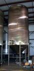 Used Apache Tank, 6500 Gallon, 316 Stainless Steel, Vertical. Approximate 102” diameter x 172” straight side. Dished top, 70” coned bottom. Side entering agitator with a 3 blade prop, driven by a 3hp...