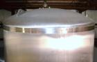 Used Apache Tank, 6500 Gallon, 316 Stainless Steel, Vertical. Approximate 102” diameter x 172” straight side. Dished top, 70” coned bottom. Side entering agitator with a 3 blade prop, driven by a 3hp...