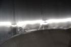 Used Apache Tank, 6500 Gallon, 316 Stainless Steel, Vertical. Approximate 102” diameter x 172” straight side. Dished top, 70” coned bottom. Side entering agitator with a 3 blade prop, driven by a 3hp...